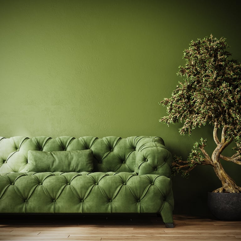 Green tufted sofa with bonsai tree modern interior